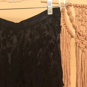 Chrissy Teigen high-waisted wise leg pants